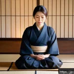 소화기질환 응급처치 방법 - A calm Japanese woman in her 30s sitting quietly on a tatami mat floor, gently holding her lower rig...